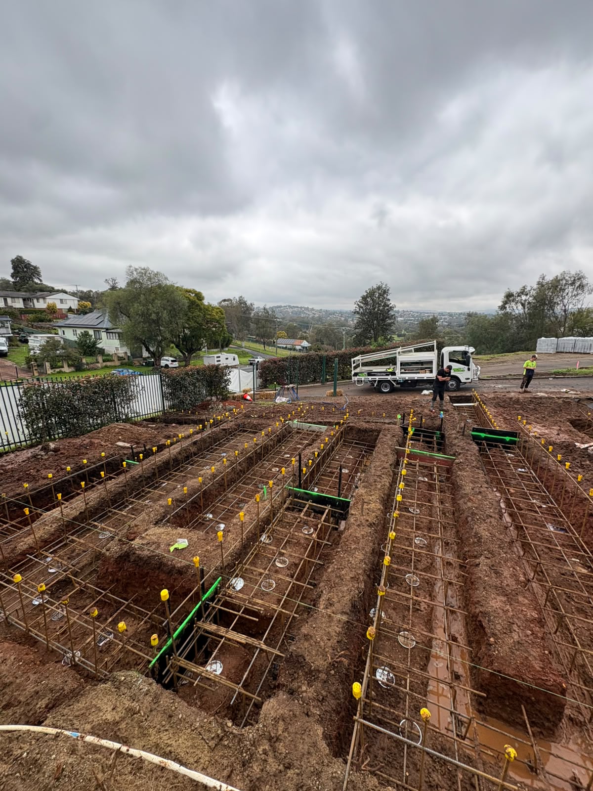 Large concrete slab being power trowelled to a finish